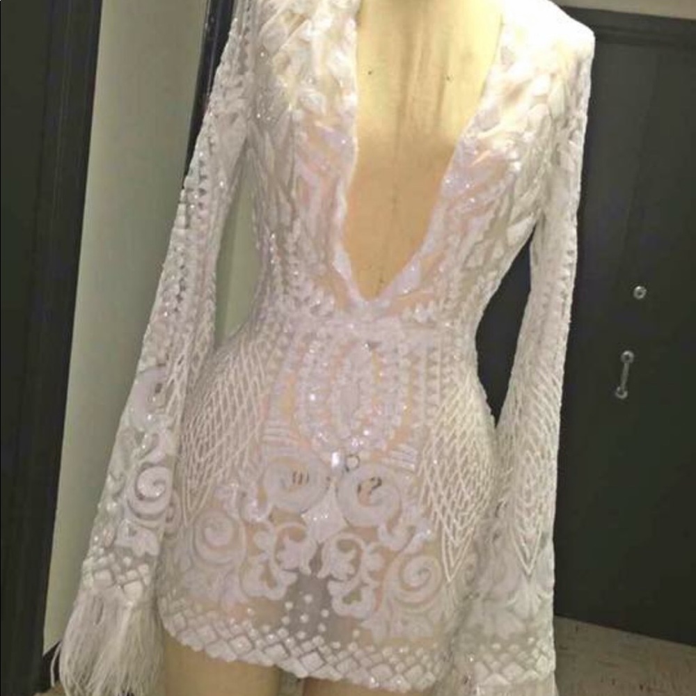 White Flare Feather Sleeve Dress.